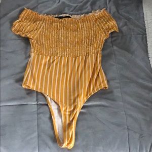 Yellow body suit